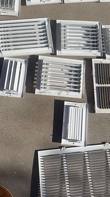 Air vent covers removed for cleaning by Dryer Vent Cleaning Austin