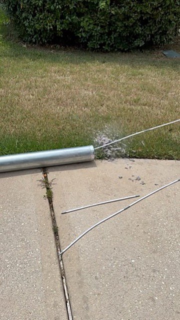 Lint cleared from a dryer vent duct after a professional cleaning